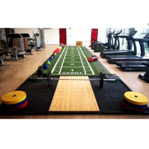 Zona de levantamiento Softee de 310x210 cm instalada en una sala de musculación – Sports Equipe